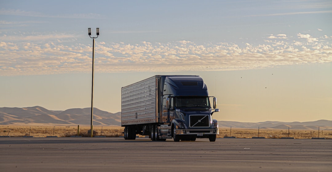 Commercial semi-truck on a highway representing trucking insurance coverage